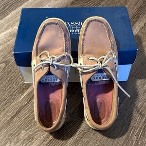 Sperry women’s Brown Leather Boat Shoes with blue and purple plaid